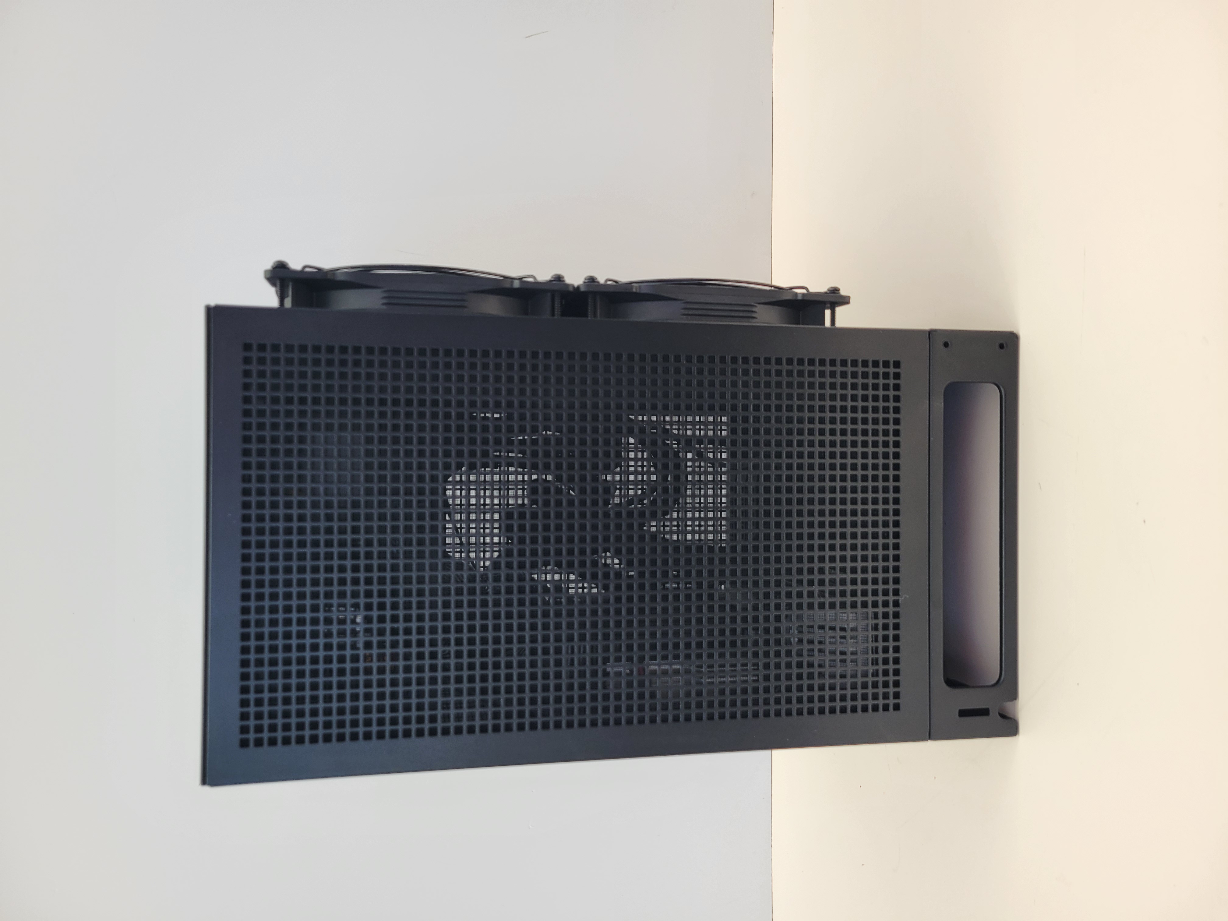 Top mesh detail showing the fan mounting geometry